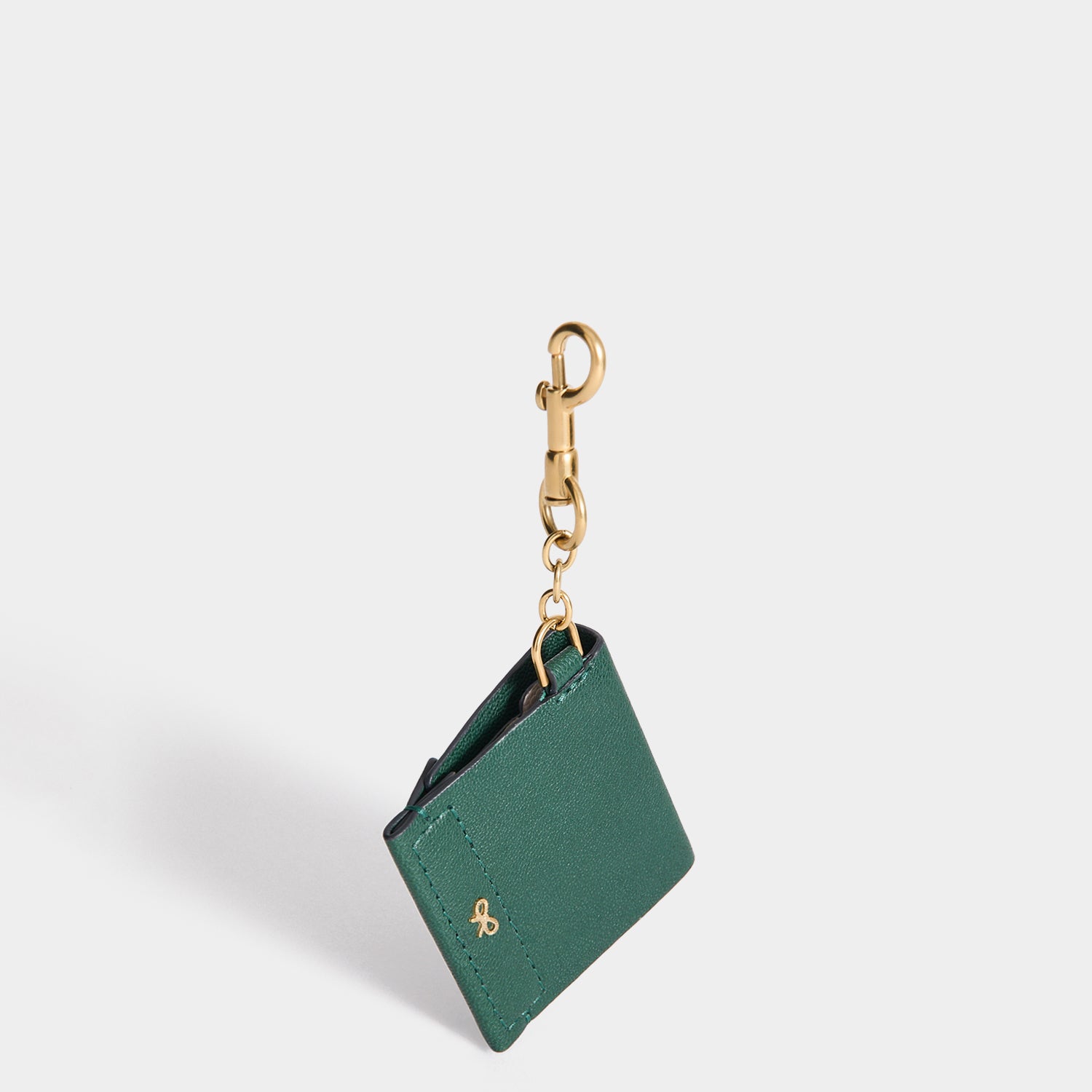 Charm Christmas in Midnight Green Shiny Capra | Anya Hindmarch US