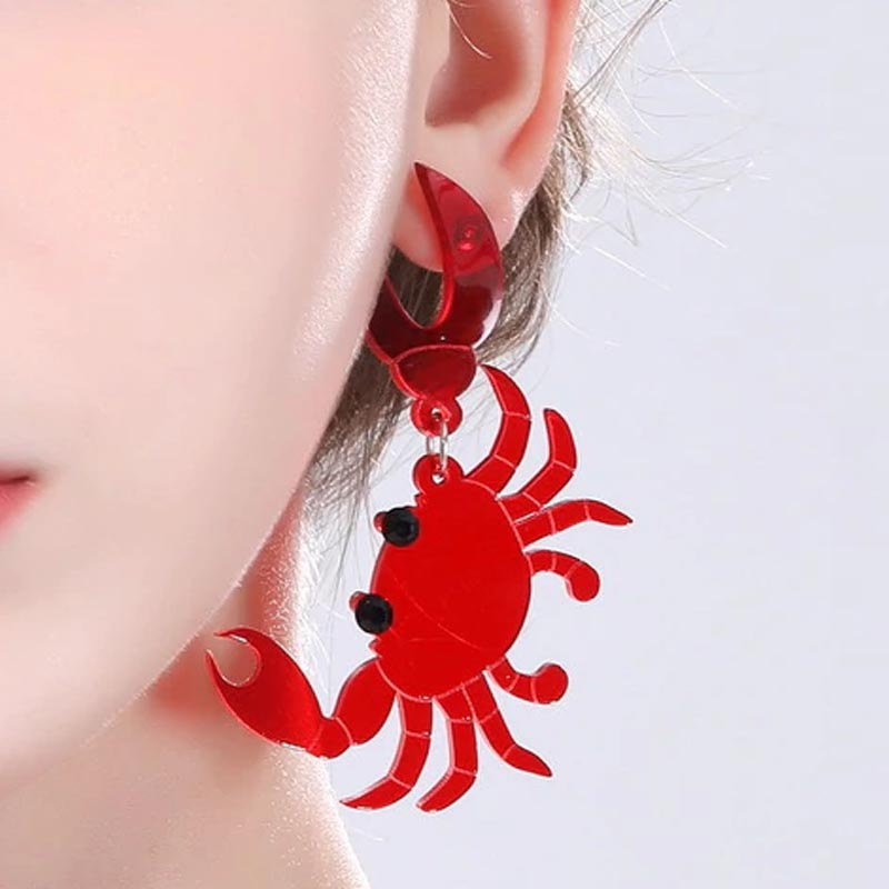楽天市場】[おもしろい ピアス] 痛いっイタタタタ！カニに耳はさまれた