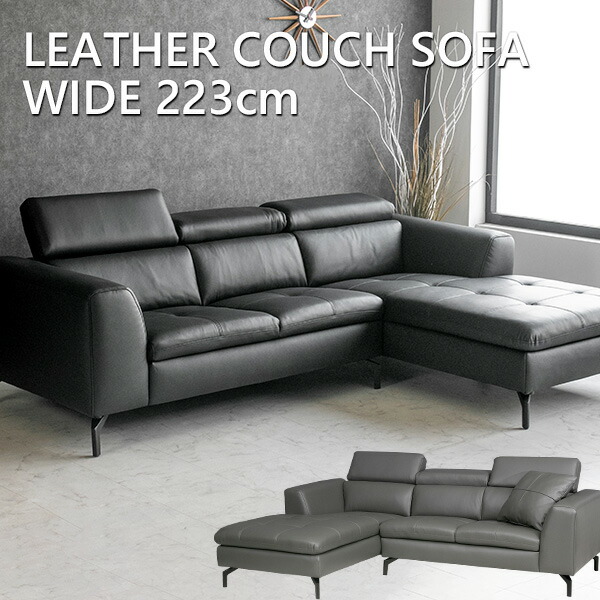 木製アームチェア・ 黒ファブリックソファ・ボタンクッション