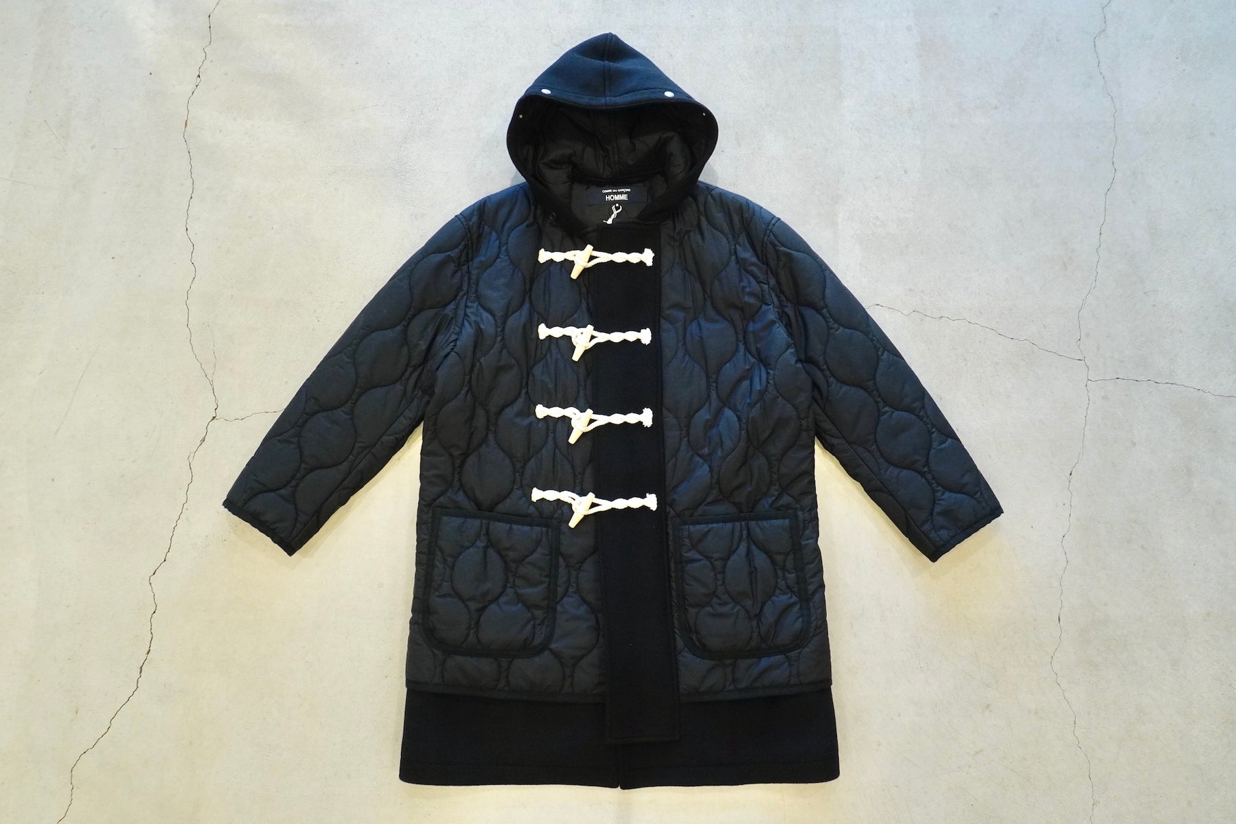 COMME des GARCONS HOMME / WOOL MELTON × NYLON QUILTING DUFFLE COAT