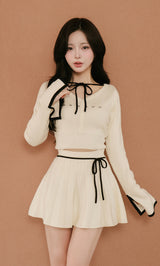 予約商品】ウエストオープンリボンデザインニットミニワンピース