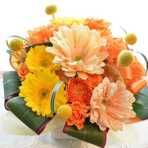 キュートなアレンジ OrangeLiqueur」| 花屋「（株）川田生花店」の