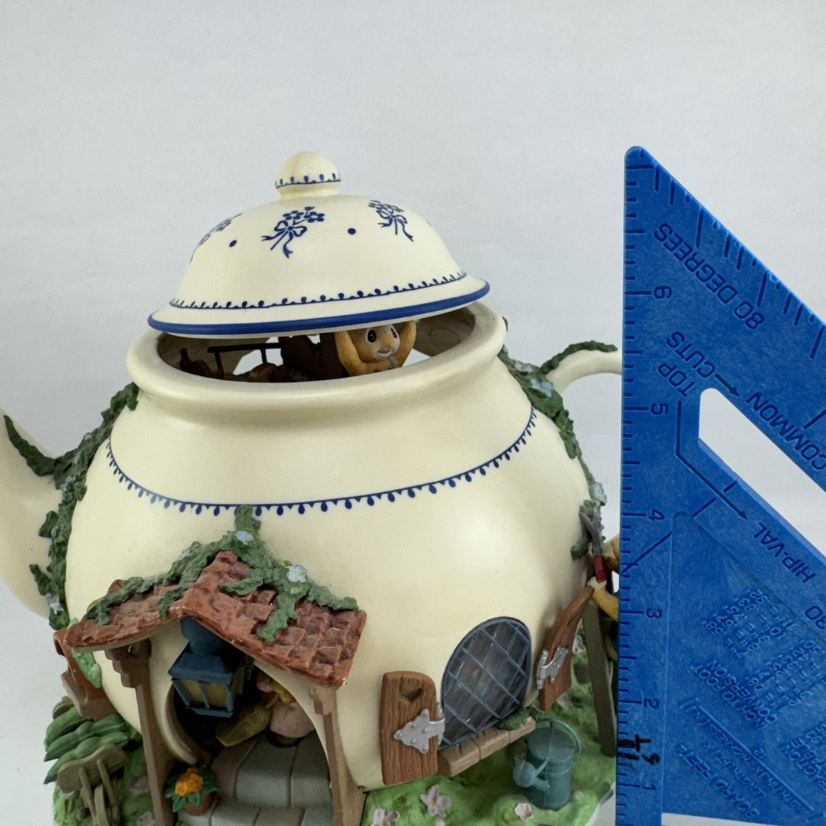 Enesco Teapot Bungalow Lighted Moving Music Box 