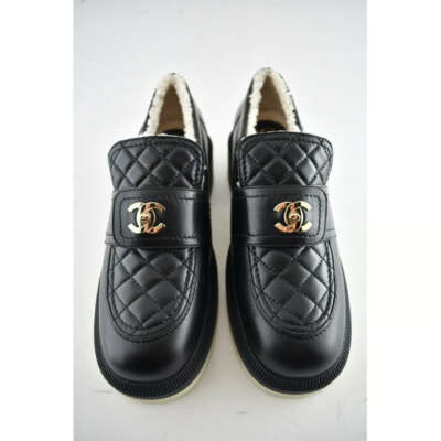 Chanel 21B Black Quilted Turnlock CC Logo Gold Shearling Fur Mule