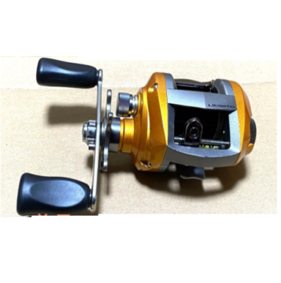 DAIWA Liberto Pixy Orange Amber Baitcast Reel Very Good Condition