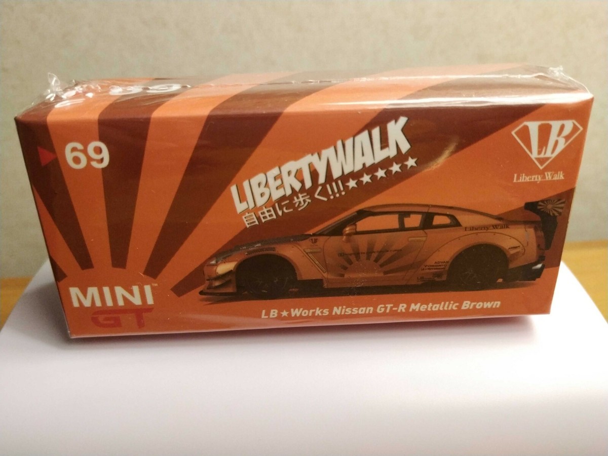 MINI GT 69 Nissan GT-R R35 Type 2, Rear Wing ver 3 Metallic Brown