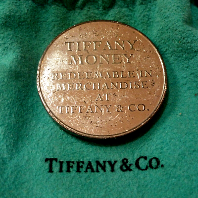 TIFFANY 50 DOLLAR STERLING SILVER REDEEMABLE IN MERCHANDISE COIN