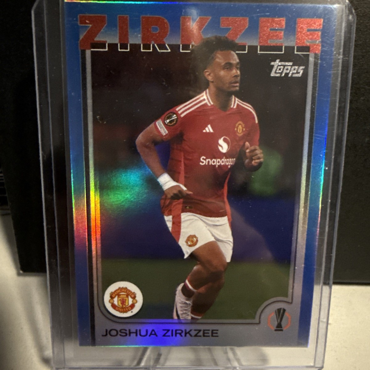 2024-25 Topps UEFA Club Competitions Joshua Zirkzee Blue Foil /125
