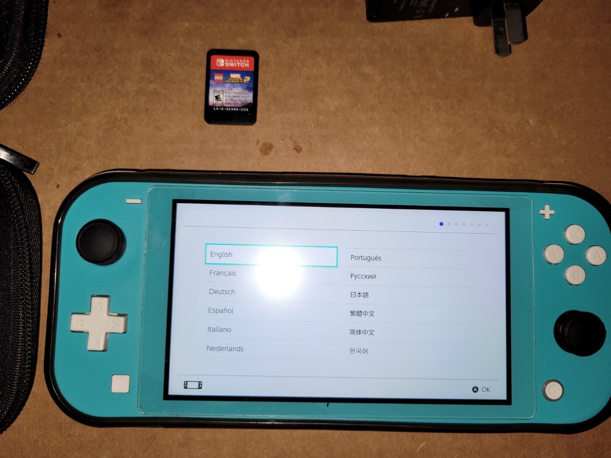 Nintendo Switch Lite Console Turquoise With 1 Game Card And Case