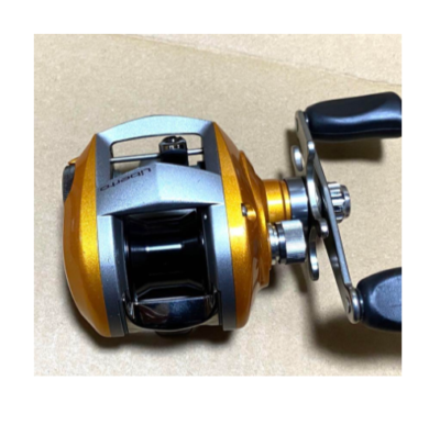DAIWA Liberto Pixy Orange Amber Baitcast Reel Very Good Condition