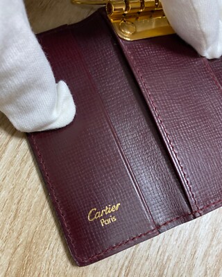 Authentic Cartier leather key holder look unused and in box no