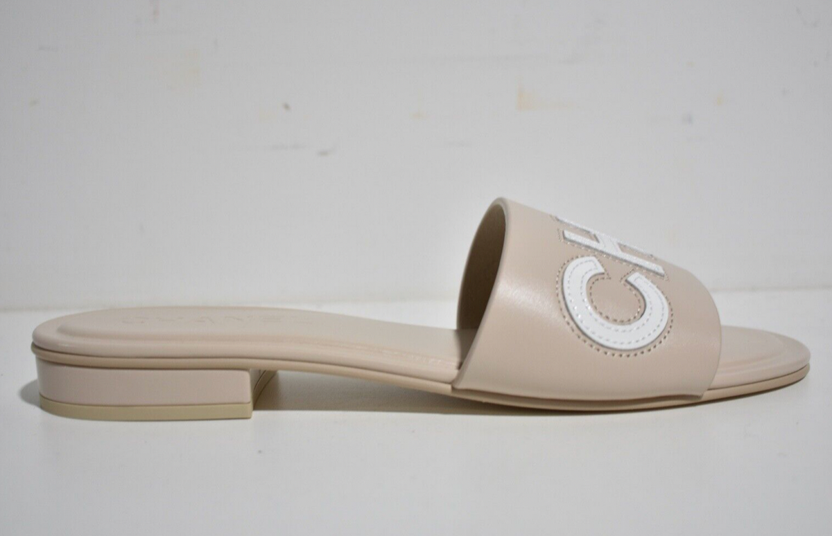 Chanel 23P Ivory White Leather CC Logo Letter Mules Slide Slip