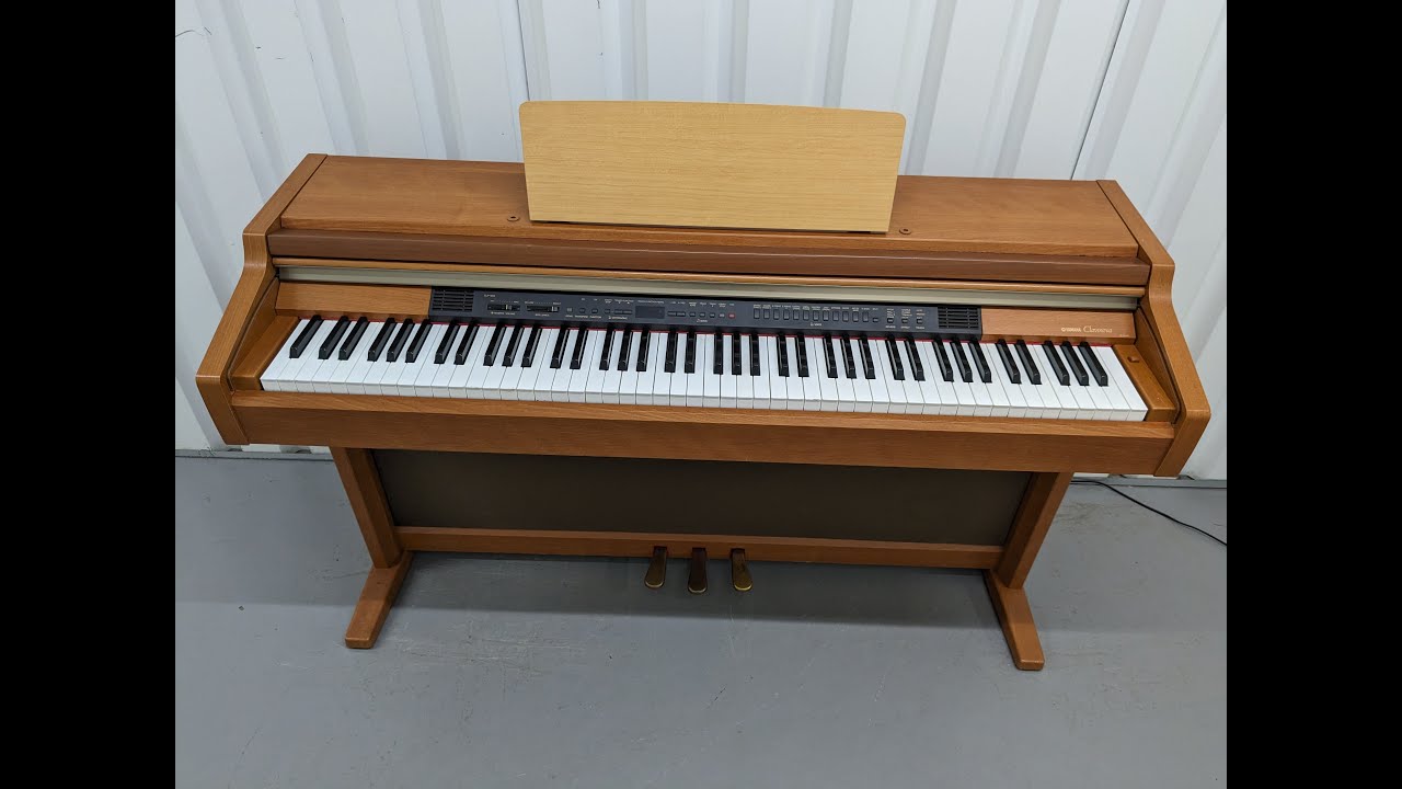 Yamaha Clavinova CLP-950 digital piano in cherry wood finish stock
