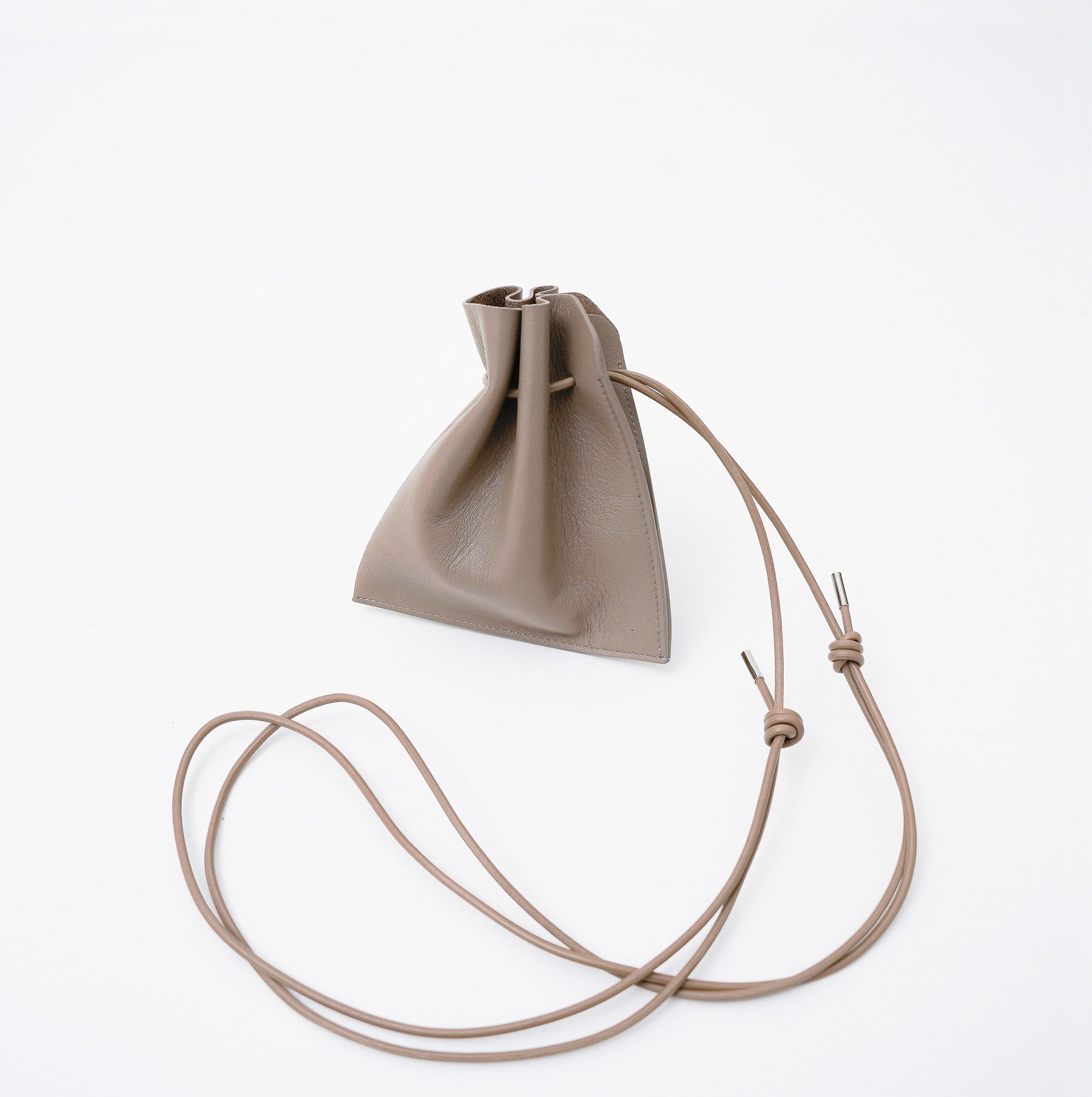 HERRIE KINCHAKU POUCH - XXS / RAPTO FLEX｜レザー ミニ巾着ポーチ 首