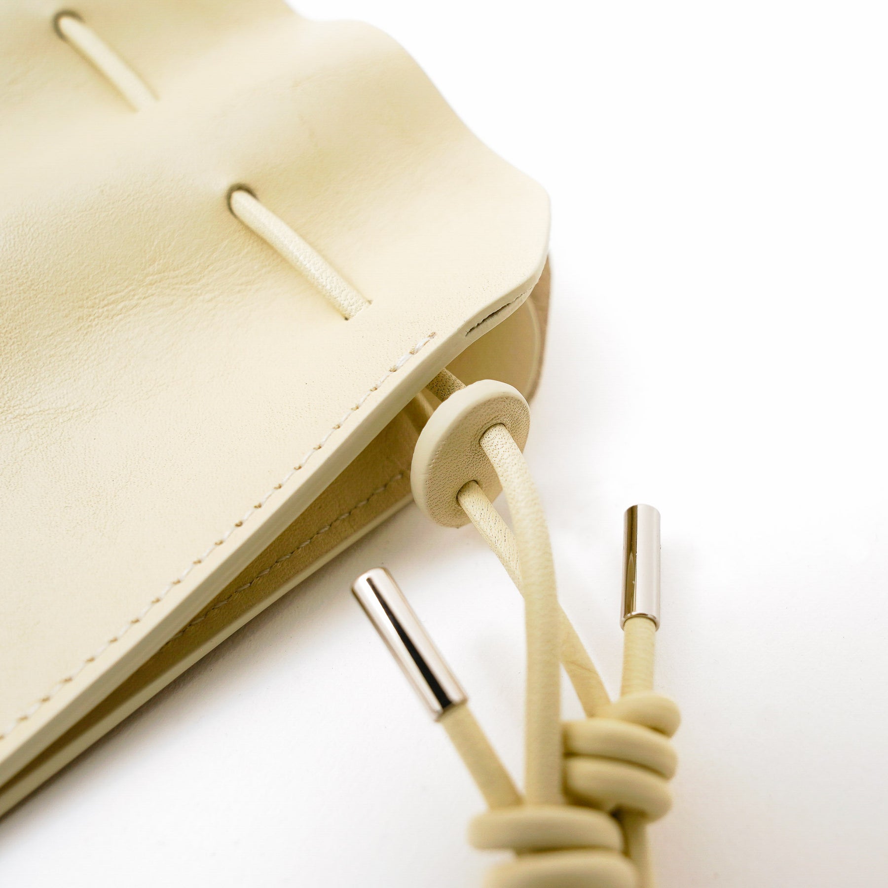 HERRIE KINCHAKU POUCH - XXS / RAPTO FLEX｜レザー ミニ巾着ポーチ 首