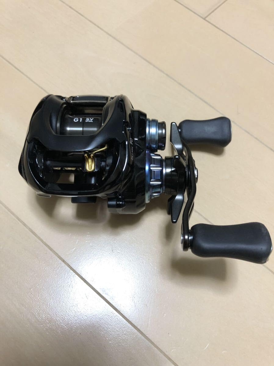 美品ジリオン10 左巻きリール 黒/紫検スティーズアルファスタトゥーラ