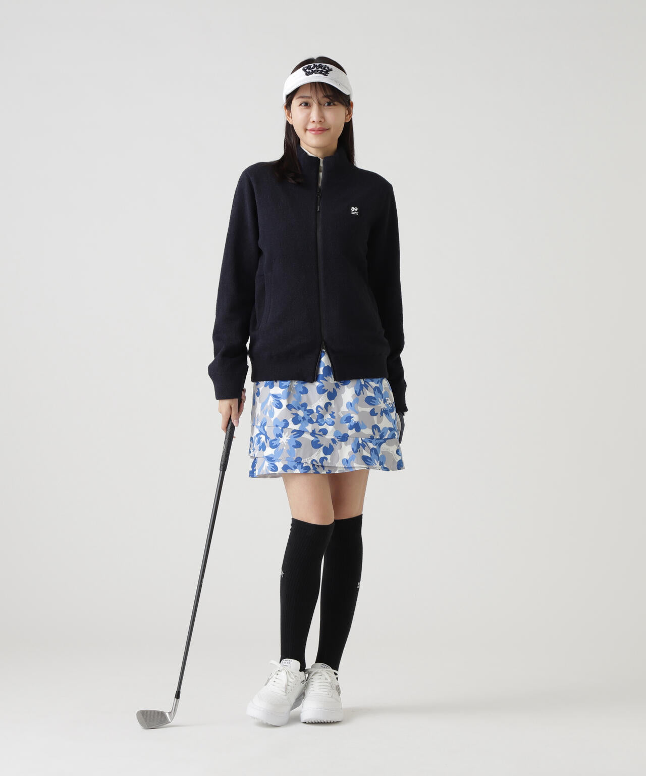 Peストレッチドビー中綿スカート ＜ラフ花ロゴ小柄＞ | PEARLY GATES