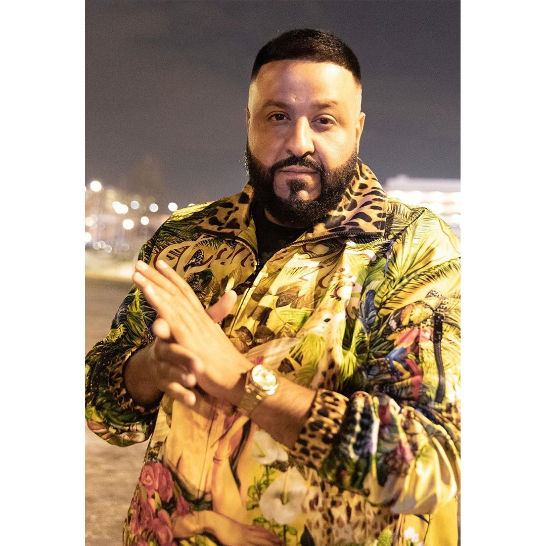 Repost from @djkhaled DJ Khaled wears a printed silk jacket with a