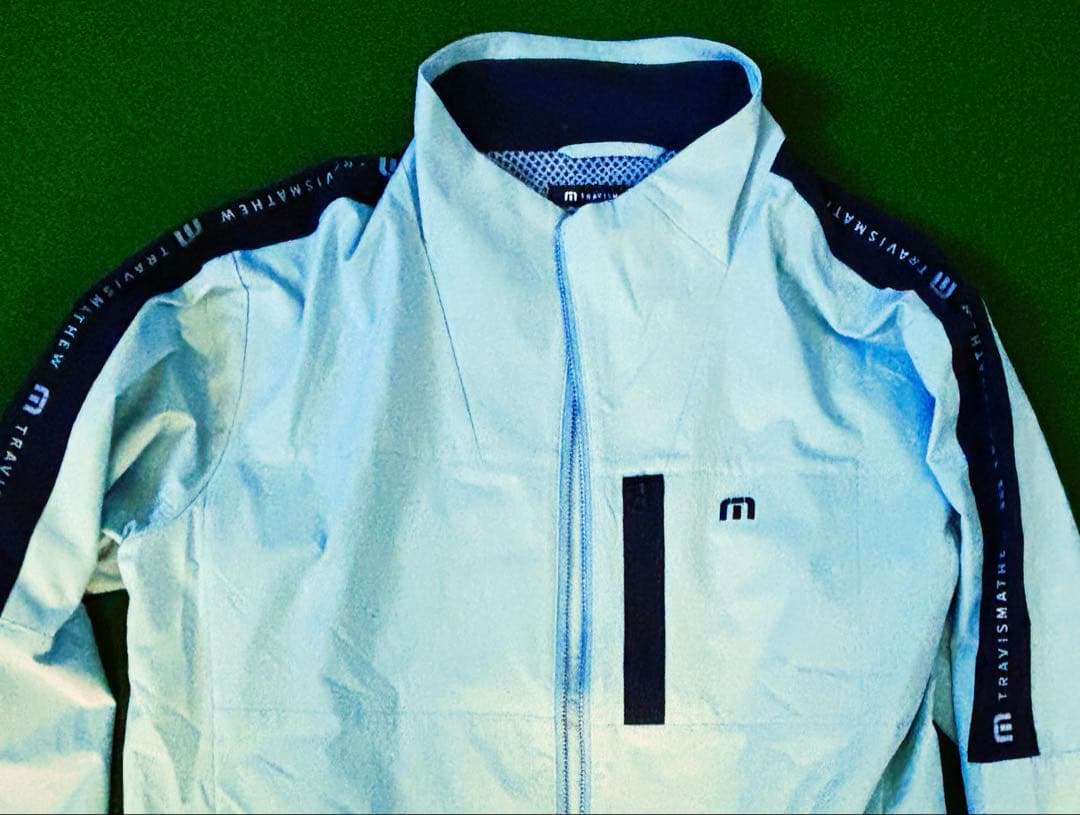 新品未使用トラビスマシュー　ラインウインドブレーカー　メンズMサイズ　ジェダイド