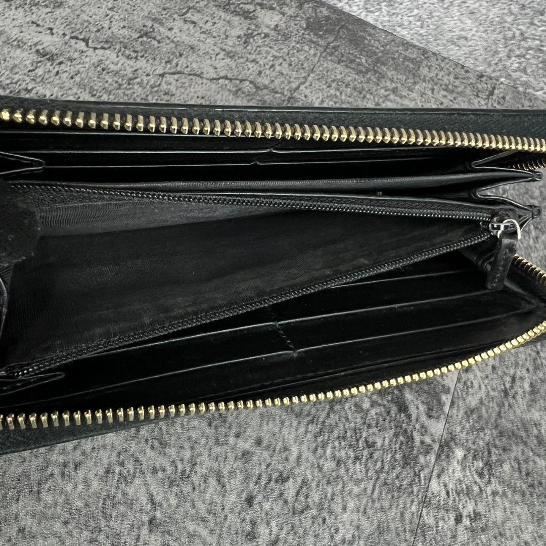 GUCCI GGエンボス インターロッキング リボン金具 ラウンド 長財布