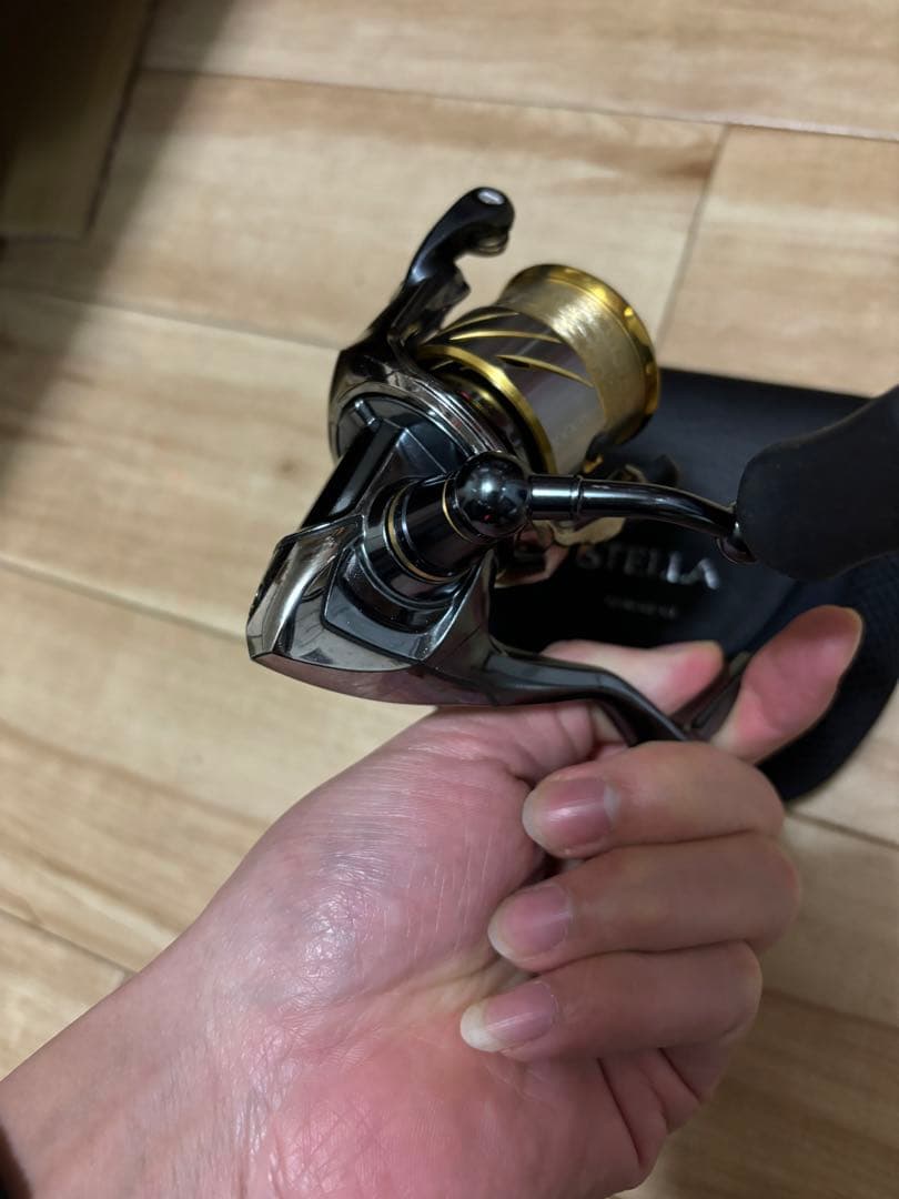 スピニングリール ステラ1000spgシルバー ゴールド キャリングケース付き