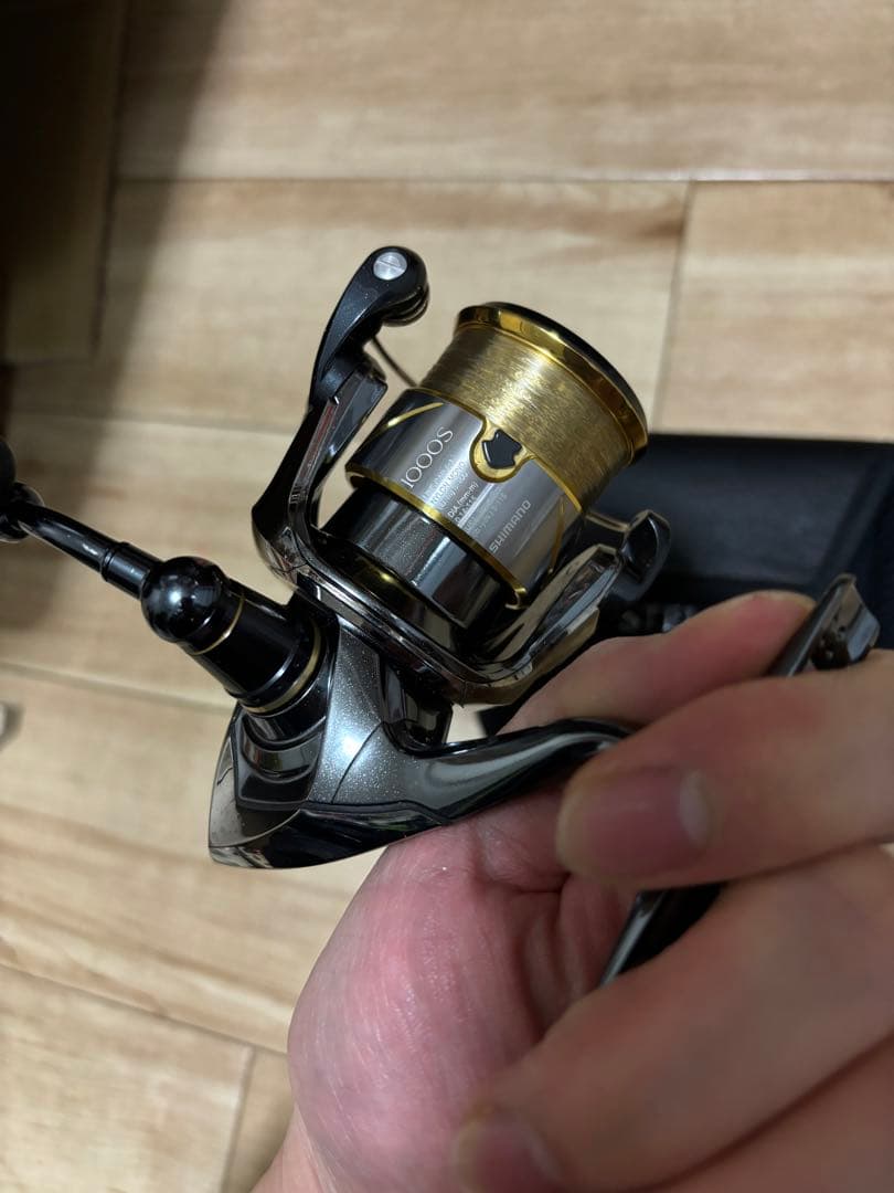 スピニングリール ステラ1000spgシルバー ゴールド キャリングケース付き