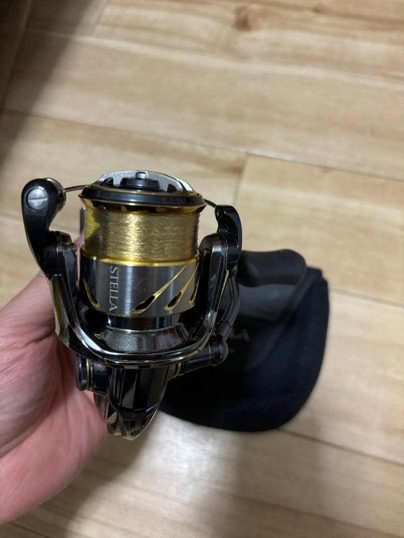 スピニングリール ステラ1000spgシルバー ゴールド キャリングケース付き
