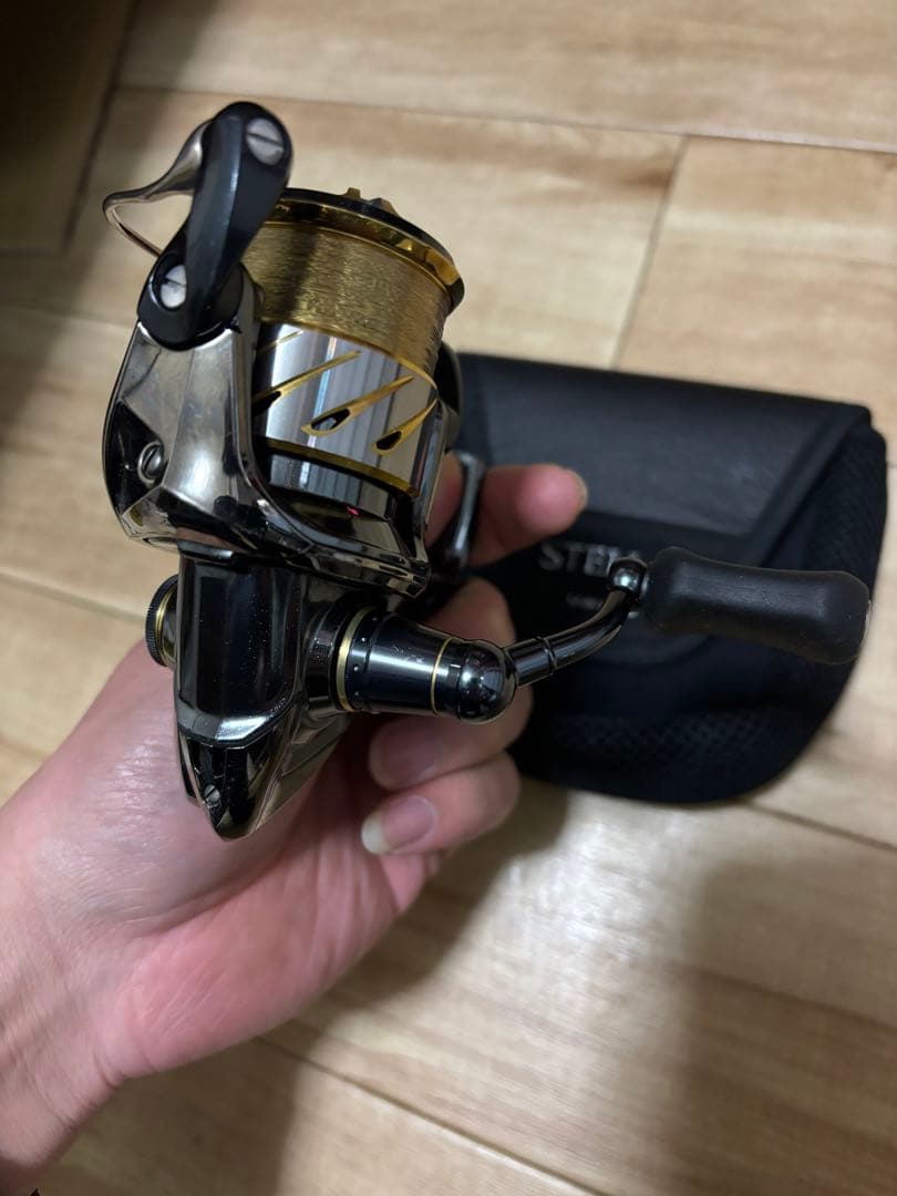 スピニングリール ステラ1000spgシルバー ゴールド キャリングケース付き