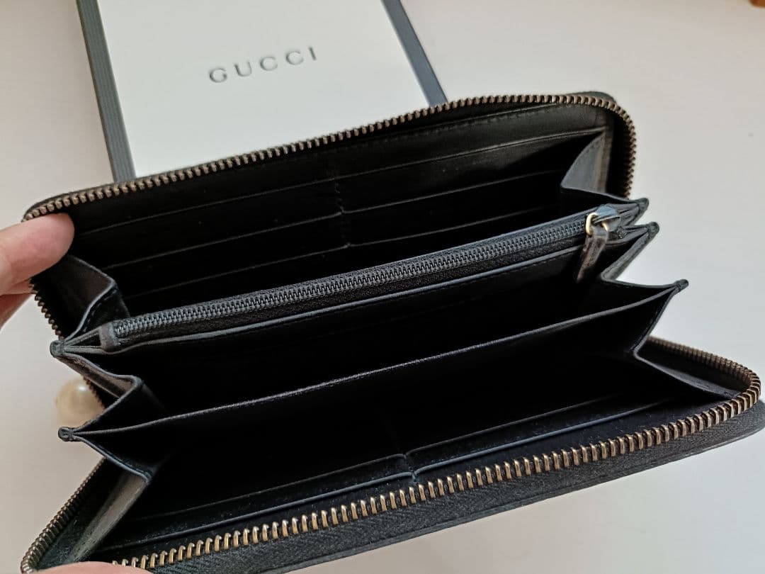 GUCCI GGキャンバス 長財布 パールチャーム付き
