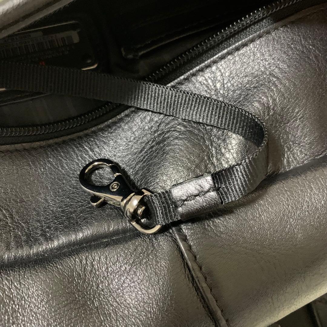 TUMI トゥミ ムラーノ Centro スリング ボディバッグ レザー 黒