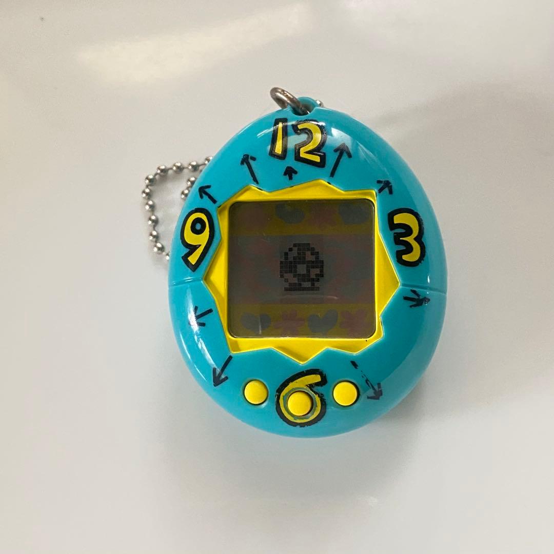 英語版 初代たまごっち 時計ブルー系 バンダイ 動作確認済み - メルカリ