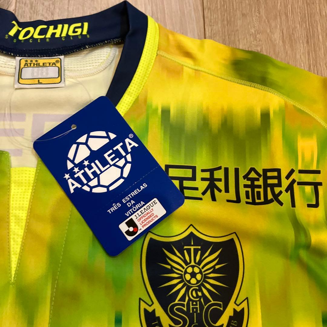 新品　ATHLETA サッカーシャツ 12番 イエロー　栃木SC