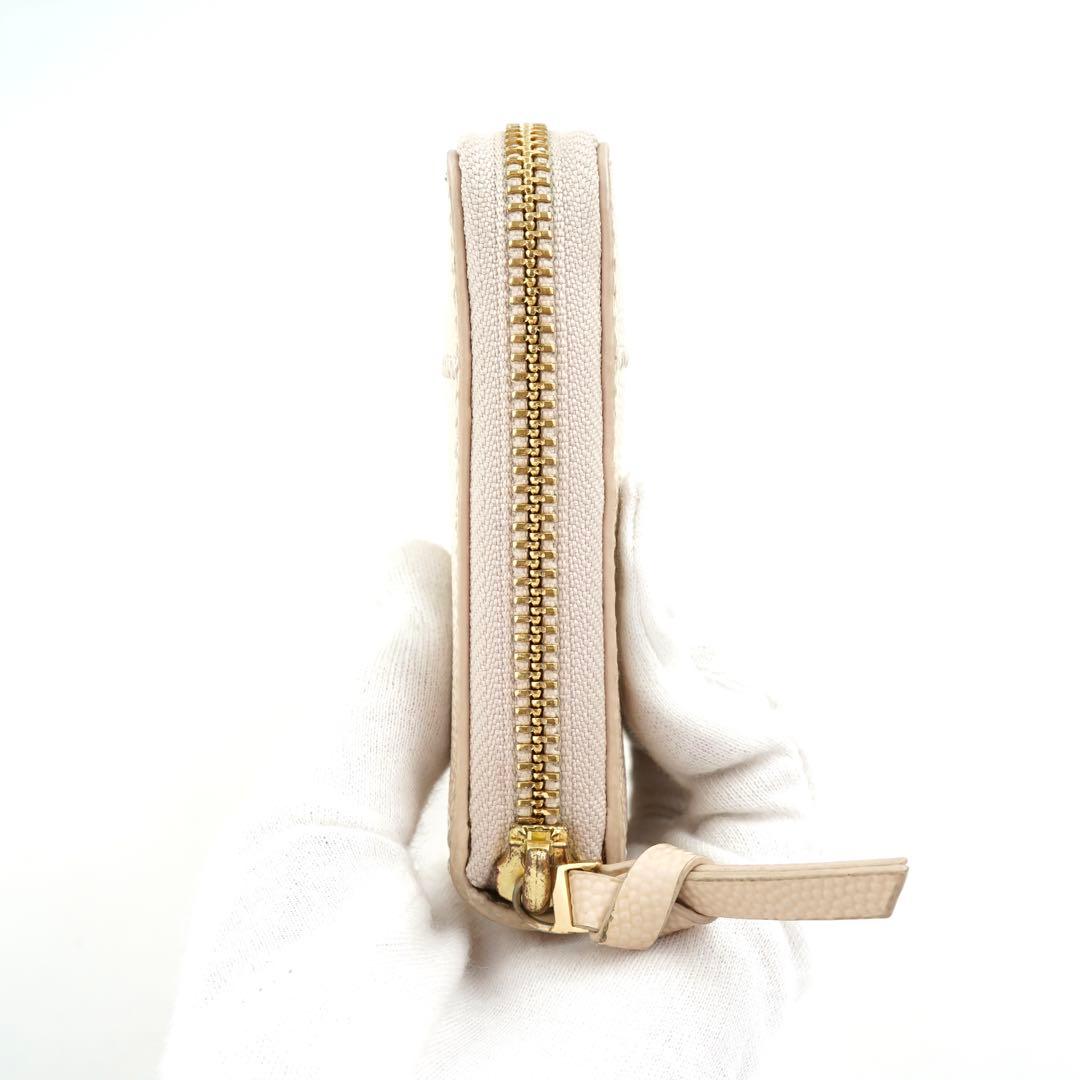 ✨未使用展示品✨　TORY BURCH 長財布　Tロゴ　ラウンドファスナー　刻印