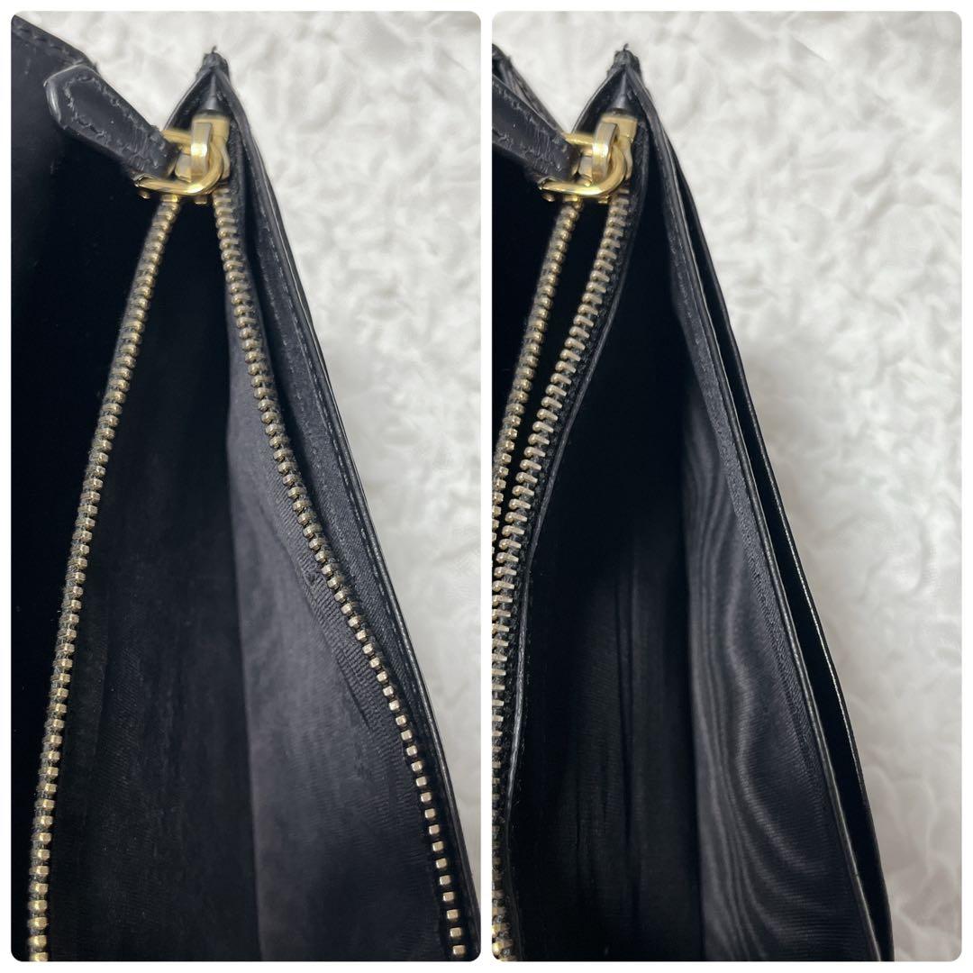 PRADA ブラック 長財布 エピレザー　フラップ　レザー　二つ折り　ゴールド