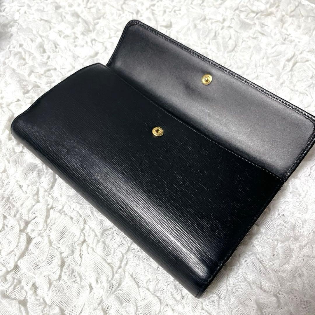 PRADA ブラック 長財布 エピレザー　フラップ　レザー　二つ折り　ゴールド