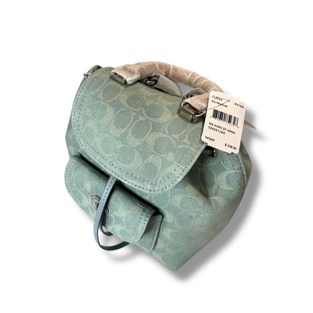 新品タグ有】COACH バックパック 21・シグネチャー デニム CJ833