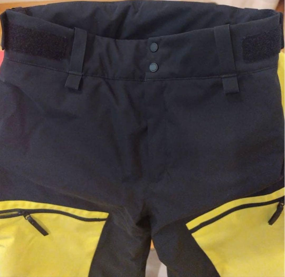 ピークパフォーマンススキースノボウェアー ブラックイエロー上160下150