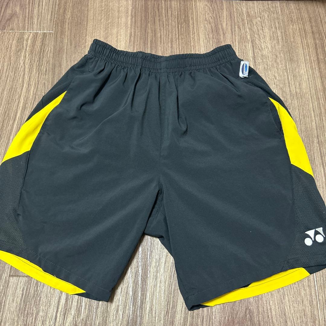 YONEX ハーフパンツ SS 黒/黄色 - メルカリ