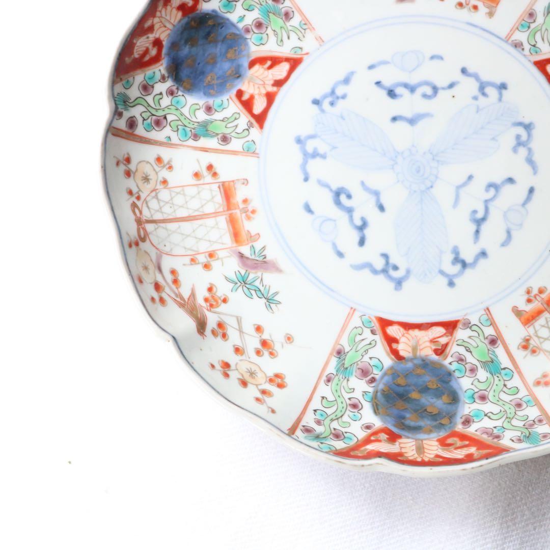 時代色絵伊万里 さわやかな赤絵に梅と鶯鳥籠図七寸皿