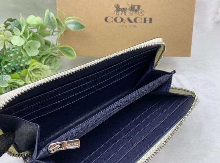 新品未使用コーチ長財布花柄シグネチャーレディースメンズ送料無料即日発送