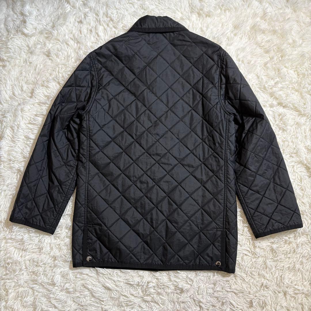 美品 Ferragamoフェラガモ キルティングジャケット ブラック - メルカリ