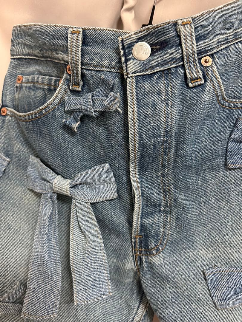 ケイスケカンダ keisukeKanda リボンまみれのデニム - メルカリ