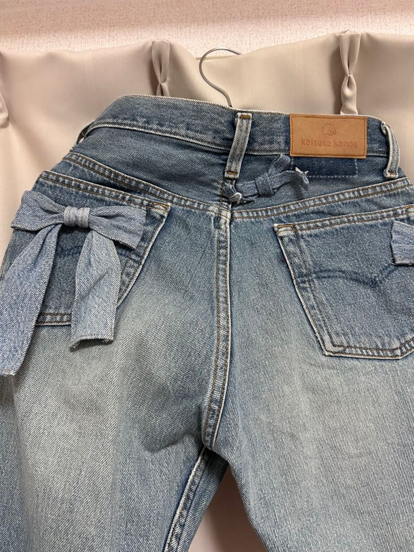 ケイスケカンダ keisukeKanda リボンまみれのデニム - メルカリ