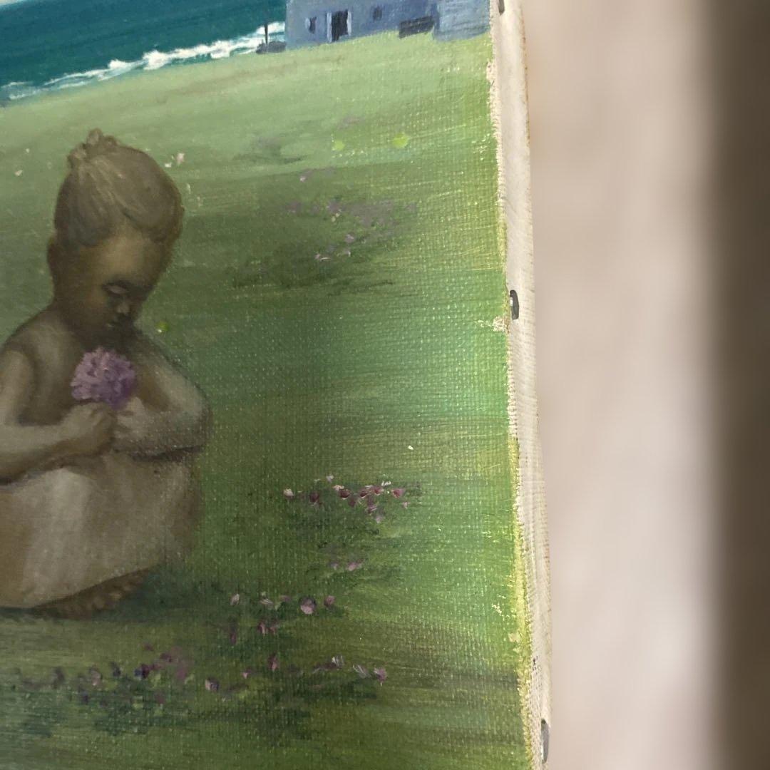 海辺の少女の油彩画