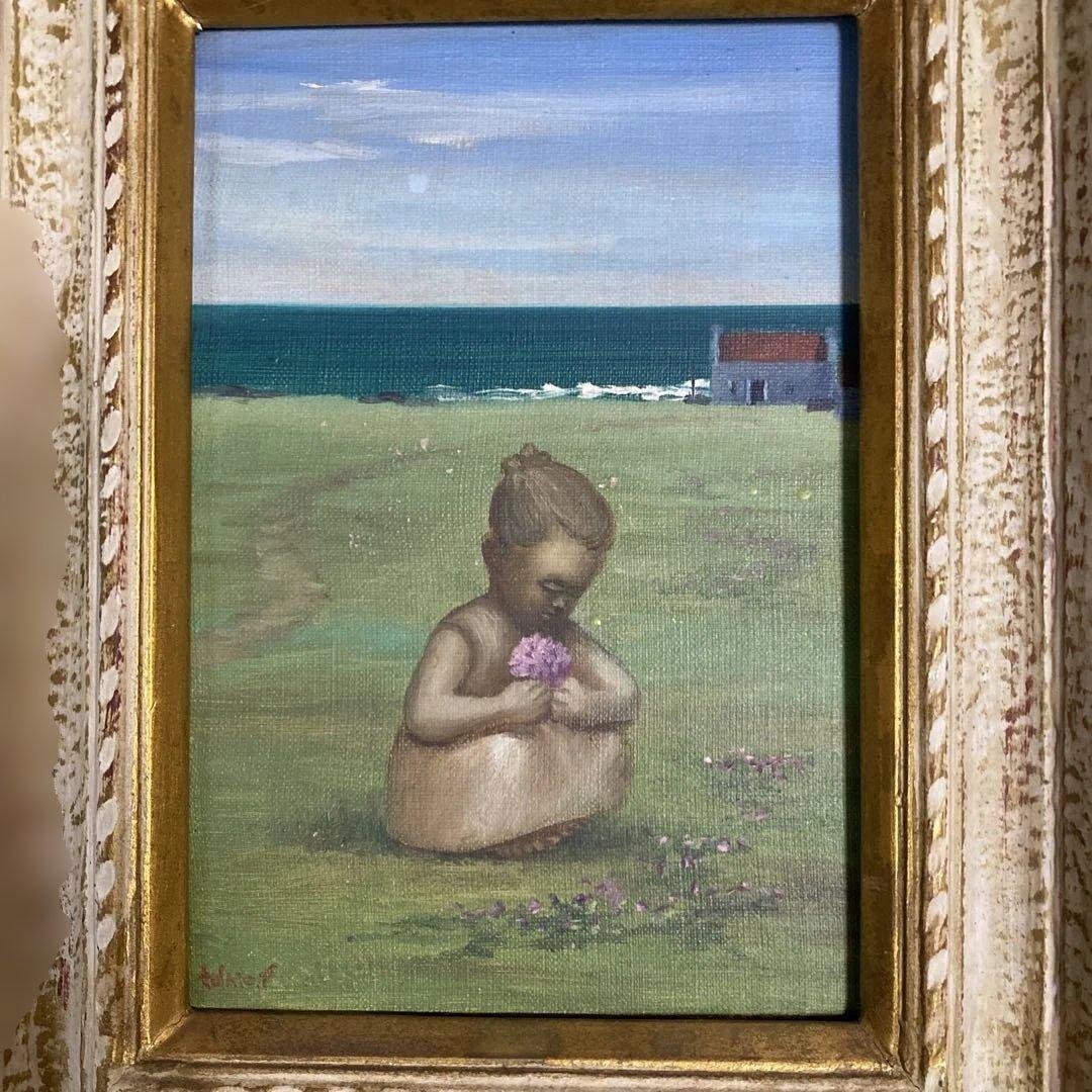 海辺の少女の油彩画