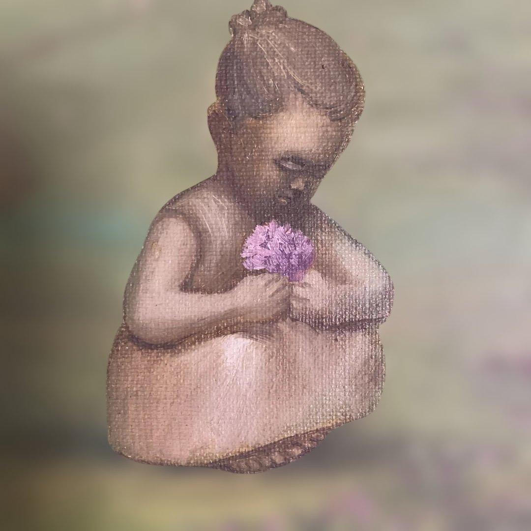 海辺の少女の油彩画