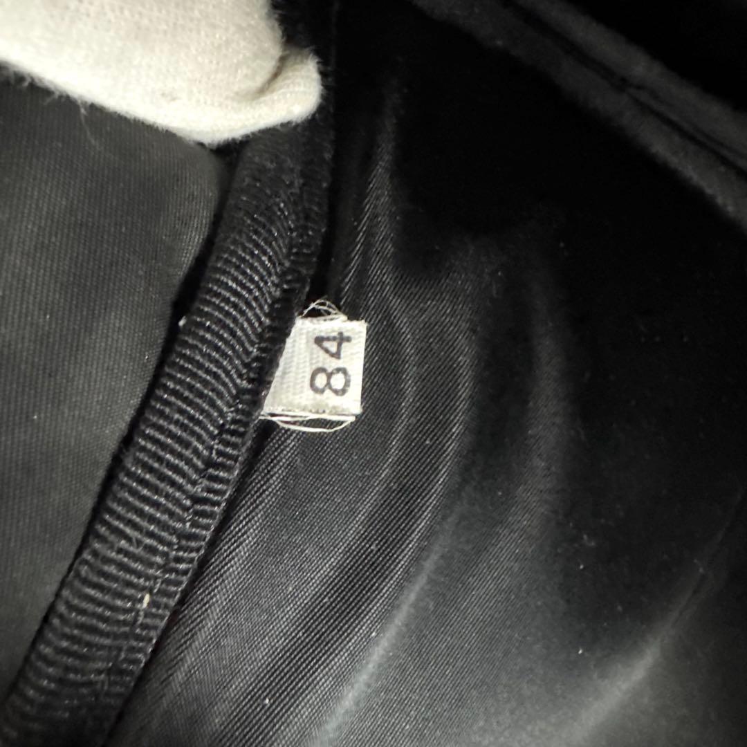 プラダ PRADA リュック 三角ロゴ ナイロン 巾着型 黒 V152