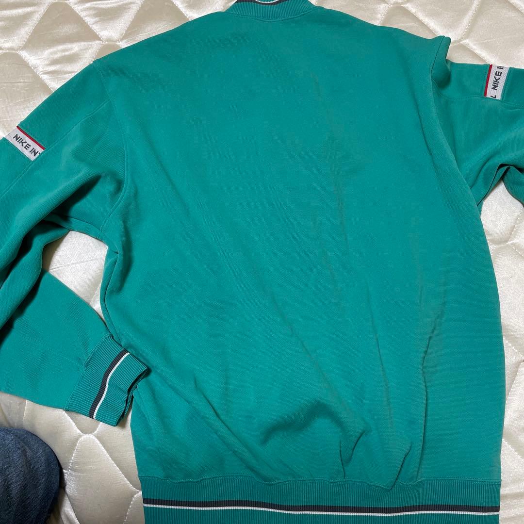 NIKE INTERNATIONAL 緑 ジップアップジャケット