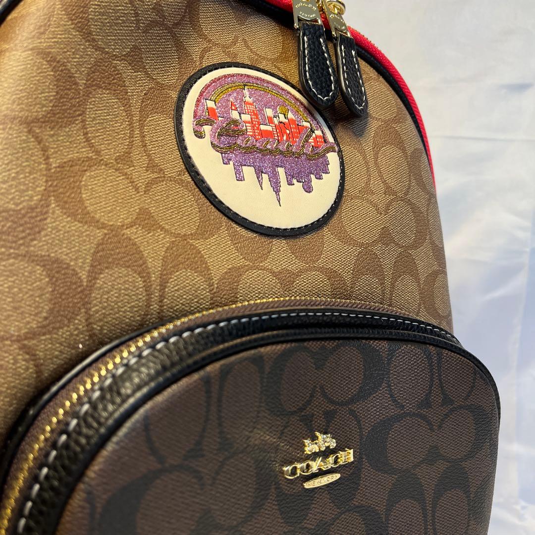 新品 COACH コーチ リュック コートブロック サインキャンバスバックパック