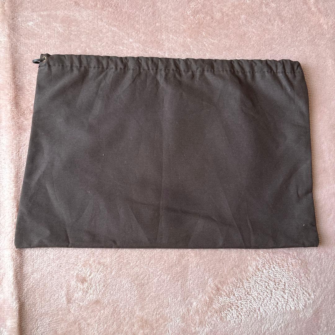 GUCCI マフラー　ブラック　ロゴマフラー(おまけの巾着付)